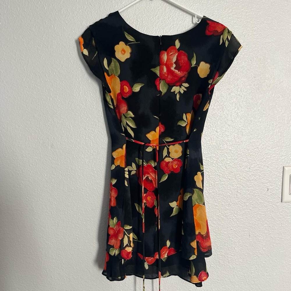 Vintage 90s scoop neck mini dress 
Caren Desiree